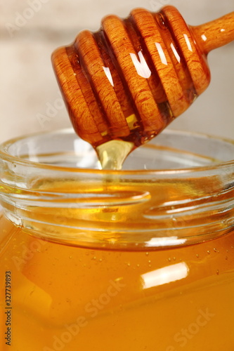 Jar of Honey with Honey Dipper photo