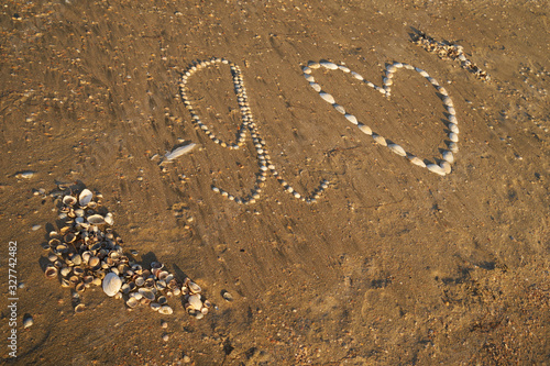 Image drawing in the sand.