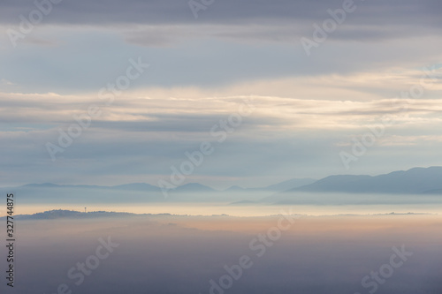 Sea of fog and mist between mountains and hills