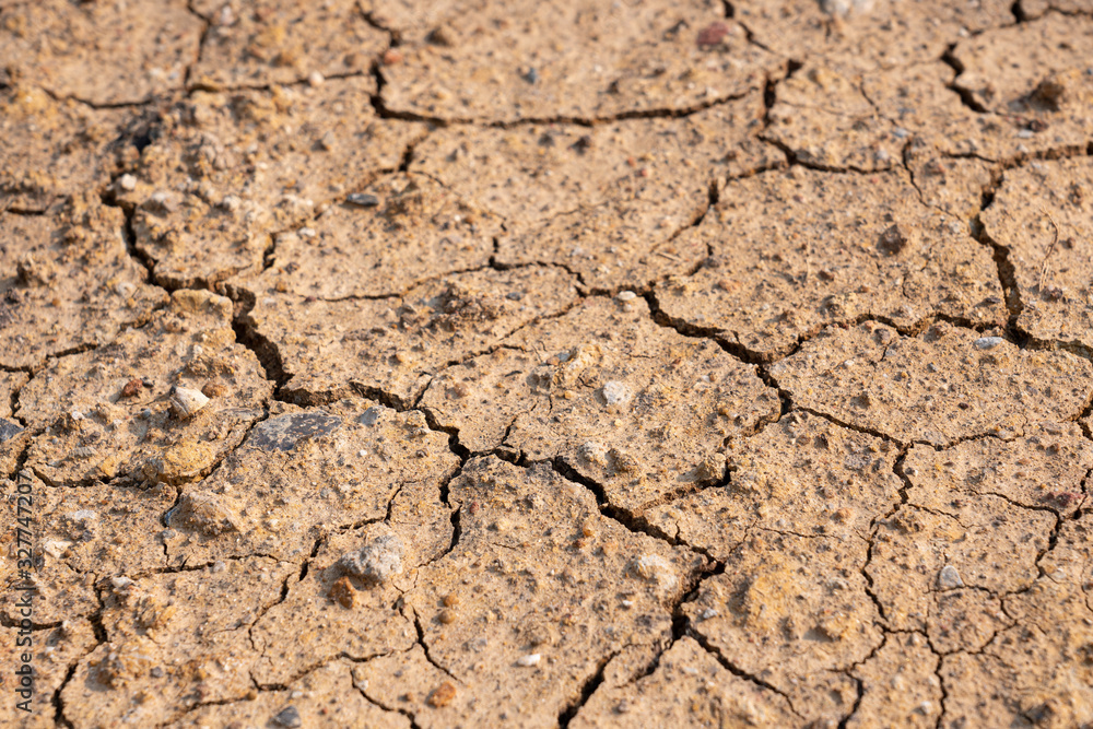 Surface of dry drought soil and ground cracked top view background. Surface of dry drought soil and ground cracked top view background.