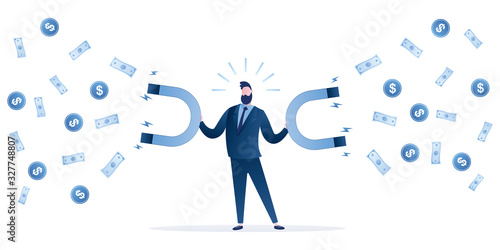 Handsome businessman holds two magnets in his hands and attracting money. Banknotes and coins fly to the employee