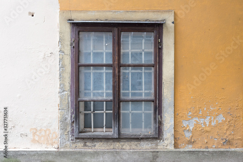 Brick walls background of ancient buildings with windows