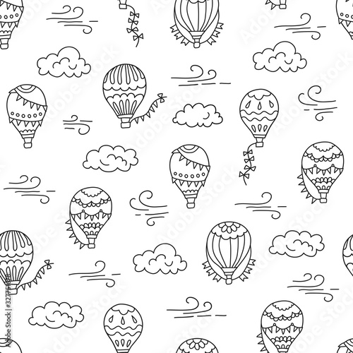 Hot air balloons and clouds. Hand drawn seamless pattern. Vector illustration in doodle style on white background