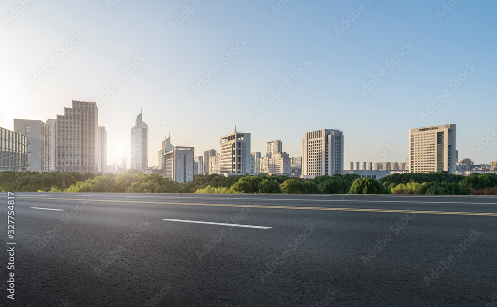 Asphalt road and urban architectural landscape of Ningbo..