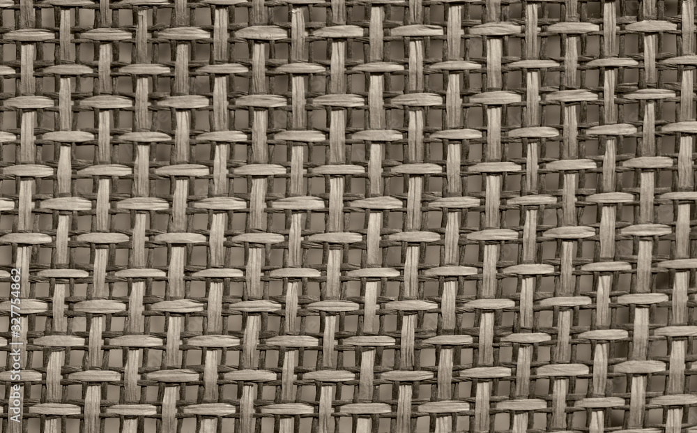 Blurred abstract beautiful straw interweaving background. Close-up of a surface made of interwoven straw lines. Natural textured background. Horizontal, closeup, free space, cropped shot, gray toning. Blurred abstract beautiful straw interweaving background. Close-up of a surface made of interwoven straw lines. Natural textured background. Horizontal, closeup, free space, cropped shot, gray toning.