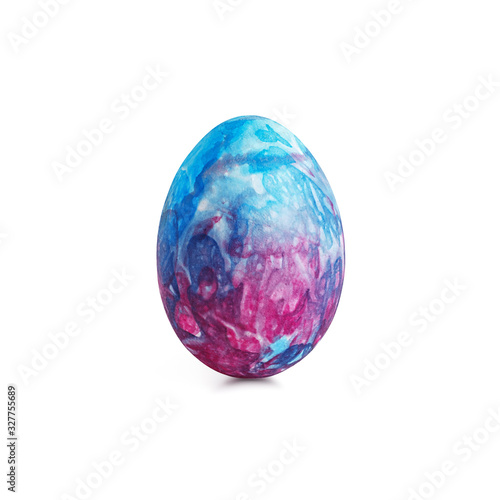 Vertical single festive easter egg with abstract creative blue and red stained pattern isolated on a white background