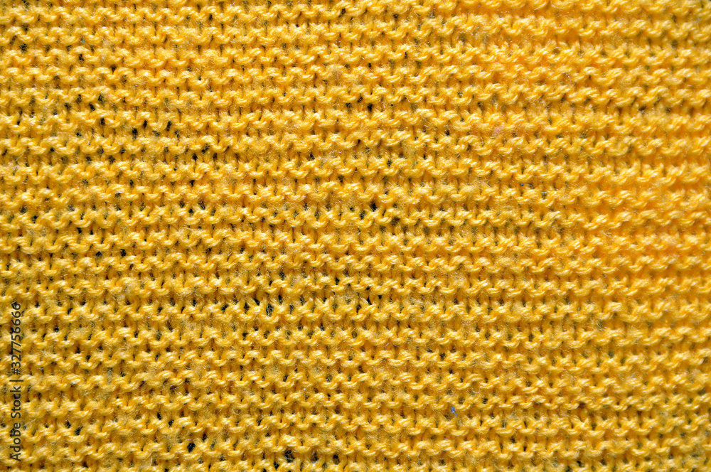 Fiber texture of woolen fabric. Yellow. Background Fiber texture of woolen fabric. Yellow. Background