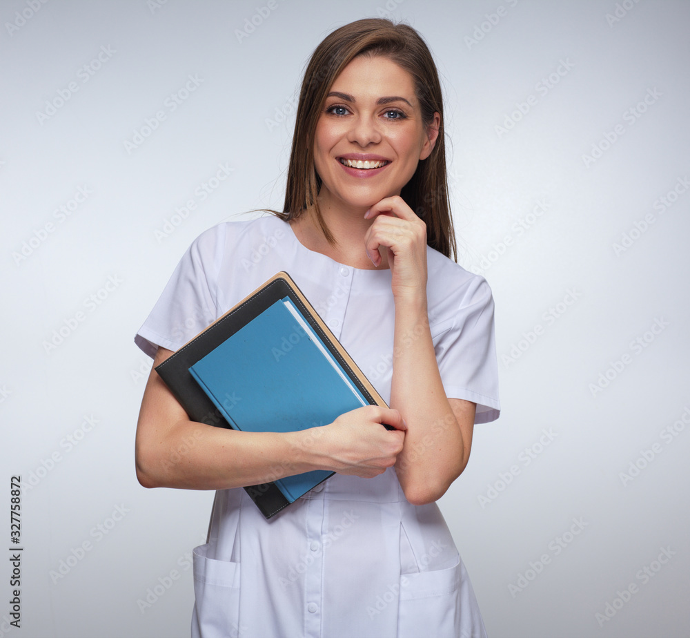 Medical worker woman doctor holding journal or book. Medical worker woman doctor holding journal or book.