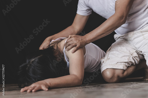 man is keeping woman's shoulders, abused woman victim of domestic violence,