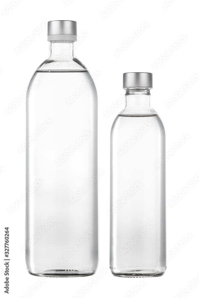 Two glass bottles of various capacities with fresh drinking water Two glass bottles of various capacities with fresh drinking water