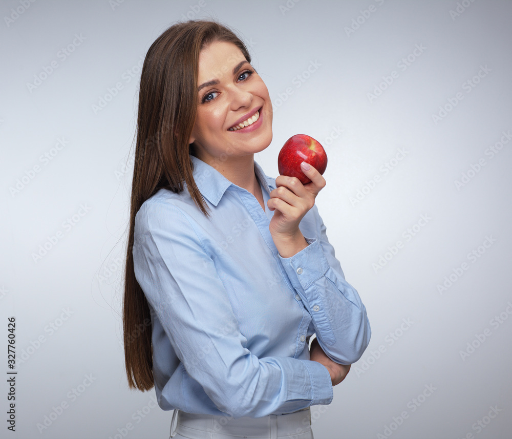 smiling woman with healthy teeth holding red apple. smiling woman with healthy teeth holding red apple.