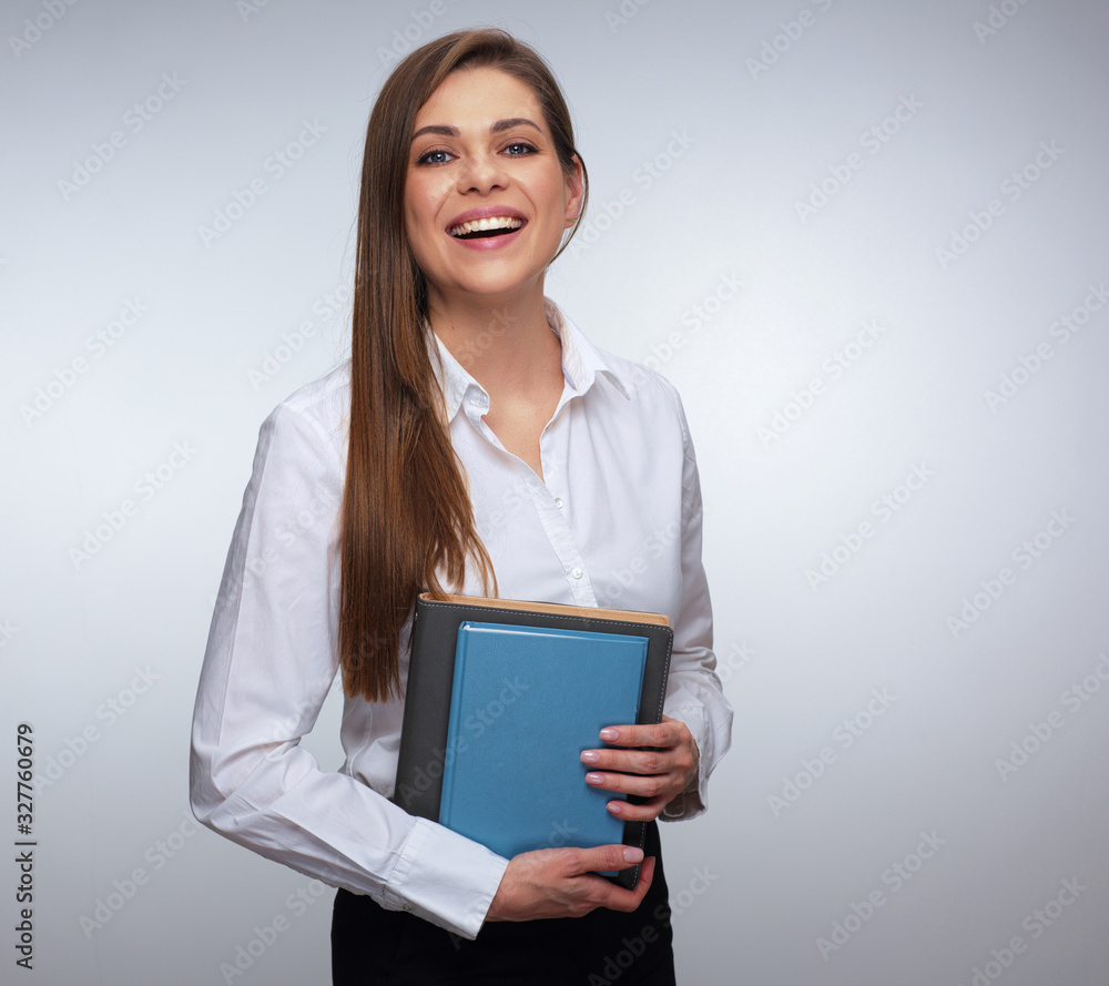 teacher or businesswoman holding book. teacher or businesswoman holding book.