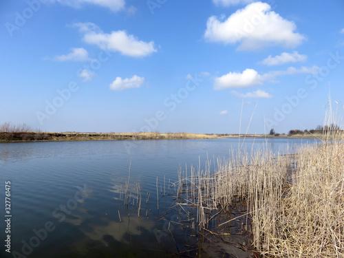 Landscape with clouds over the lake