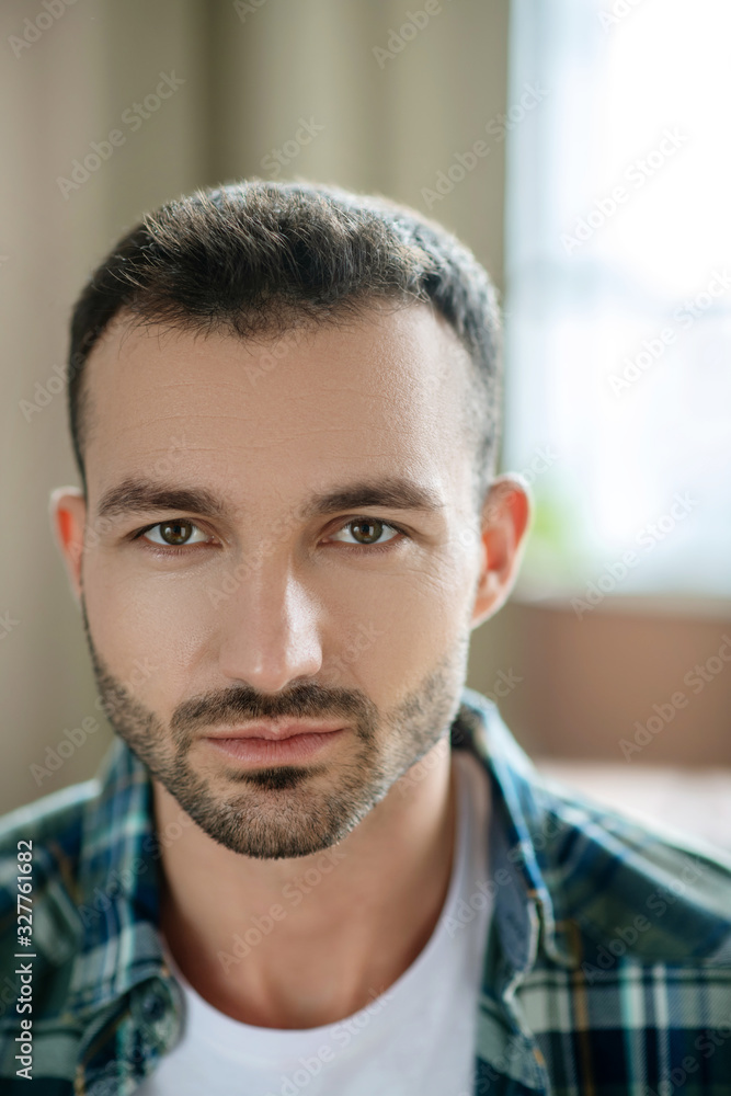 Fototapeta premium Portrait picture of a young bearded man