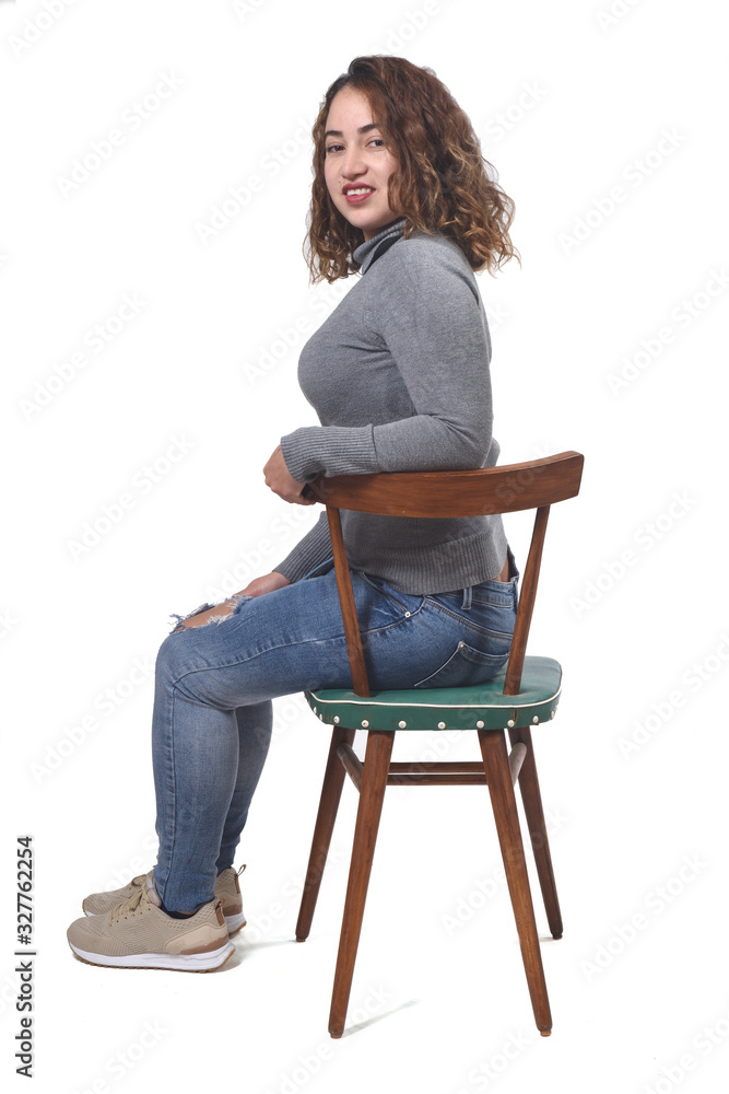 portrait of a woman sitting on a chair in white background, portrait of a woman sitting on a chair in white background,