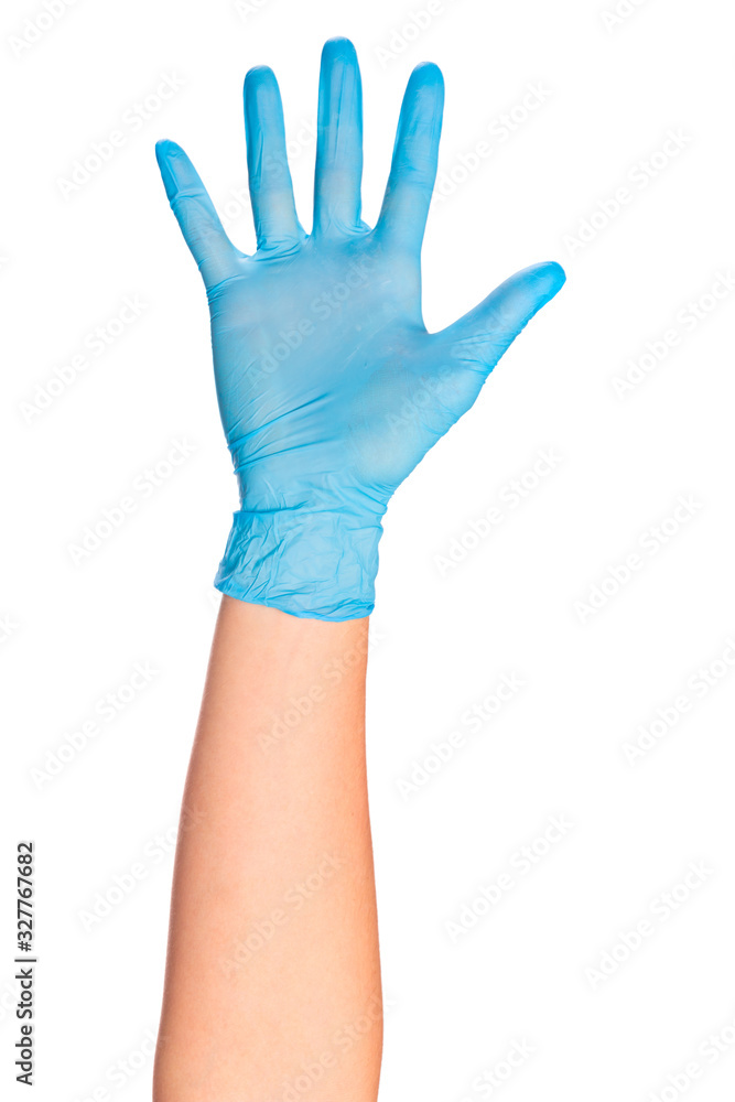 female hand in sterile gloves isolated on white background showing .hand gestures- Image female hand in sterile gloves isolated on white background showing .hand gestures- Image