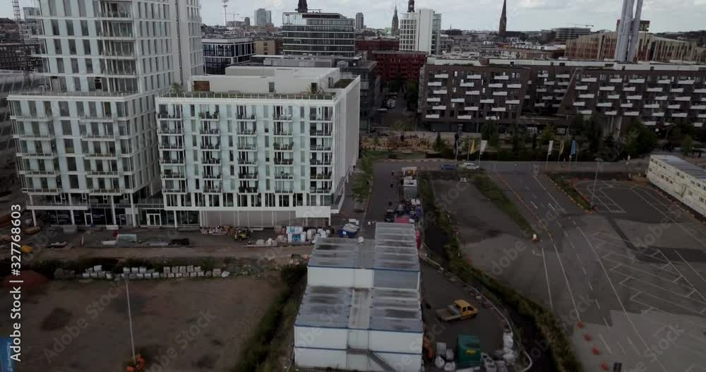 The Huge Elbphilharmonie Concert Hall In Hamburg Germany With Tall Buildings And Beautiful Architectural Structures - Aerial Shot The Huge Elbphilharmonie Concert Hall In Hamburg Germany With Tall Buildings And Beautiful Architectural Structures - Aerial Shot