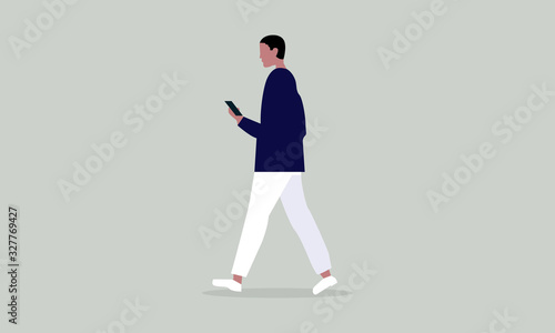 Fototapeta Naklejka Na Ścianę i Meble -  a man walking while holding the phone. people icon vector illustration