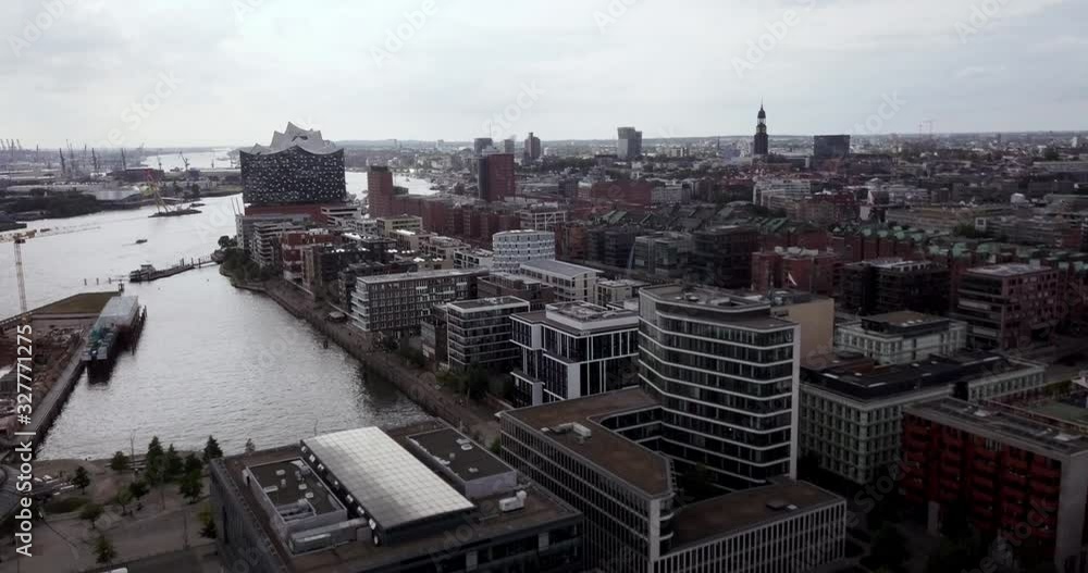 Contemporary Buildings Under Construction Near The Iconic Elbphilharmonie Concert Hall On The Grasbrook Peninsula Of The Elbe River In Hamburg Germany - Aerial Shot Contemporary Buildings Under Construction Near The Iconic Elbphilharmonie Concert Hall On The Grasbrook Peninsula Of The Elbe River In Hamburg Germany - Aerial Shot