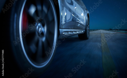 Low angle side view of car driving fast © jamesteohart