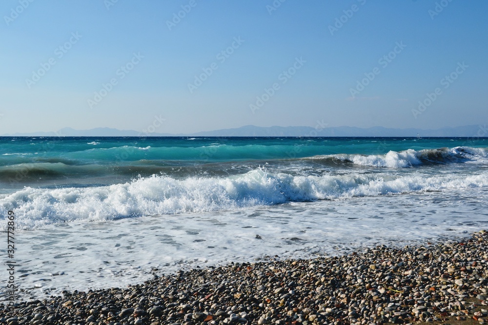 Ixia, Rhodes. Pebble beach in Paralia/Ixia, on the north coast of the island, 4 km from the Rhodes town - island's capital