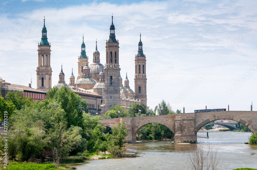 Nuestra Senora del Pilar is one of Spain's largest baroque temples and the largest temple of Zaragoza. Stone Bridge on the Ebro River