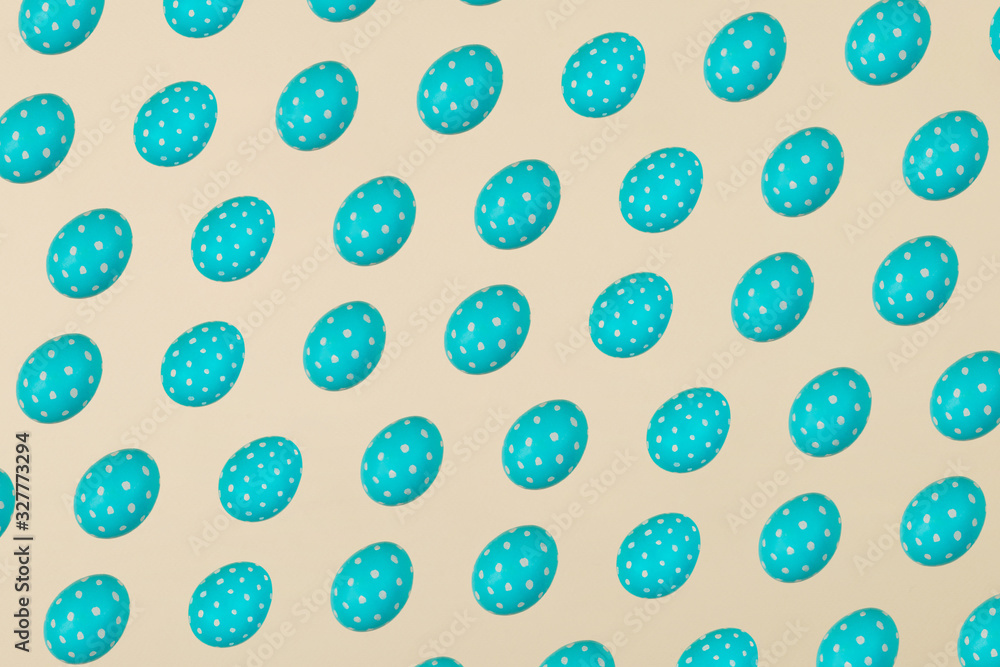 Blue Easter eggs on a yellow background. Festive preparation, pattern, repetition, banner. Blue Easter eggs on a yellow background. Festive preparation, pattern, repetition, banner.