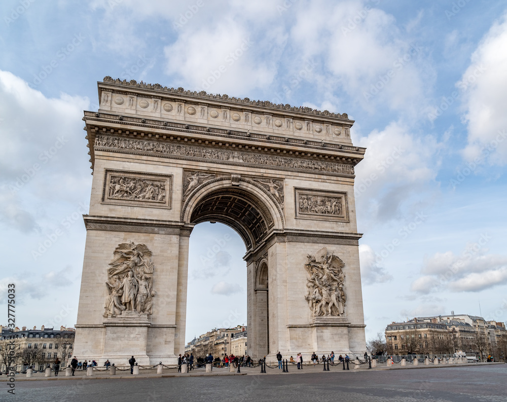 Arc de Triomphe at Charles de Gaulle square in winter - Paris, France