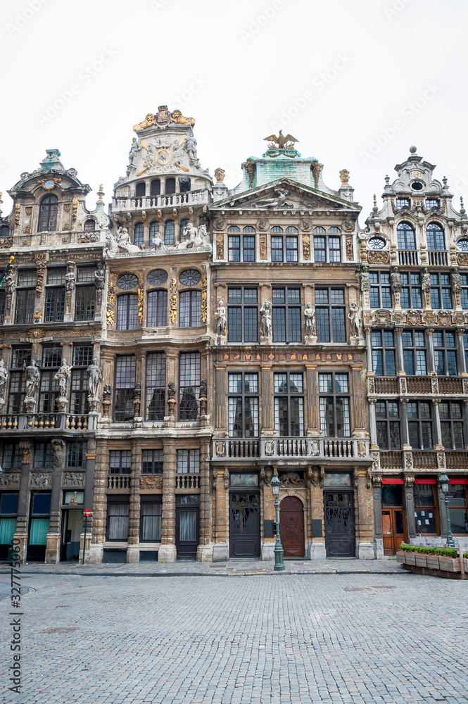 Scenic empty view of row of traditional Gothic guildhalls including Le Renard, Le Cornet, La Louve, and Le Sac in the Grand Place, Brussels, Belgium
