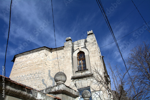 old building and old stone ball on the wall architectural creation