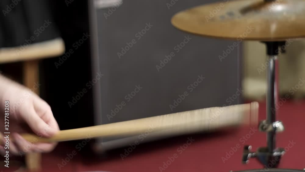 Drummer is playing. Sticks and Drums, Rehearsal Drummer is playing. Sticks and Drums, Rehearsal