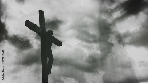 Jesus Christ crucified . The Crucifixion of Christ with Stormy clouds time lapse. Vintage film look