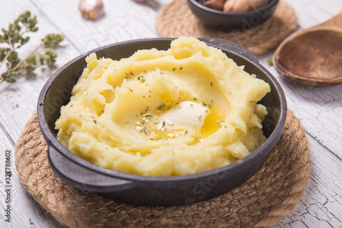 Fresh homemade creamy mashed potato in bowl (Selective Focus, Focus on the tip in the potato puree)