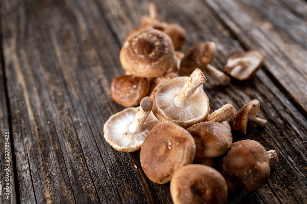 Shiitake on rustic wooden background Shiitake on rustic wooden background