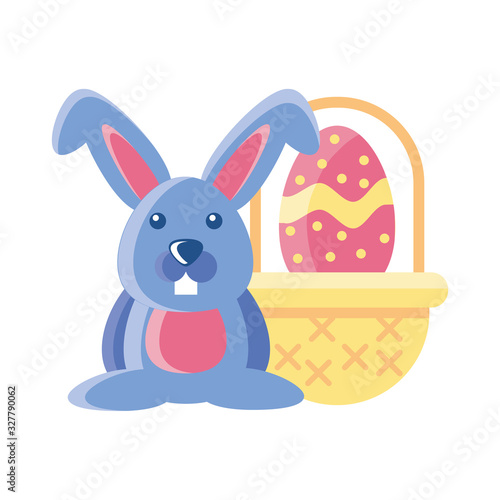 wicker basket with cute rabbit on white background