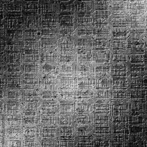 A texture similar to the Egyptian characters metal look of anoth photo