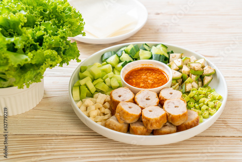 Vietnamese pork  meatball with vegetables wraps (Nam-Neaung or Nham Due)