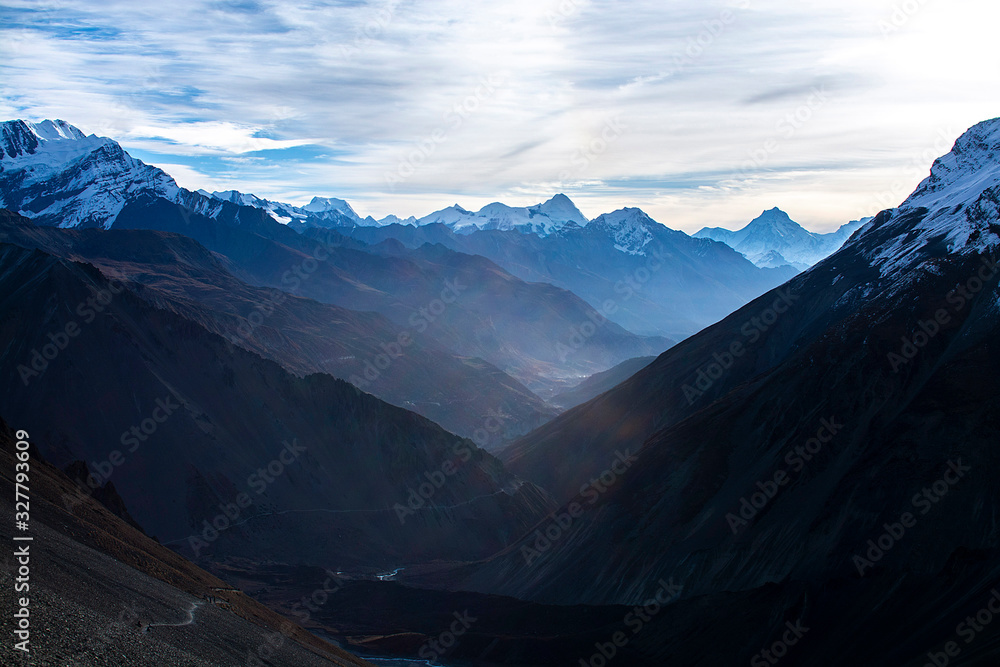 Mountains in Nepal with clouds on sky, Annapurna Circuit Trekking Route in Himalaya