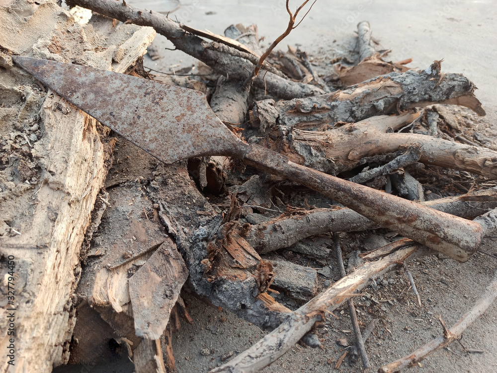 Fototapeta premium pile of rusted wood lying with an around it