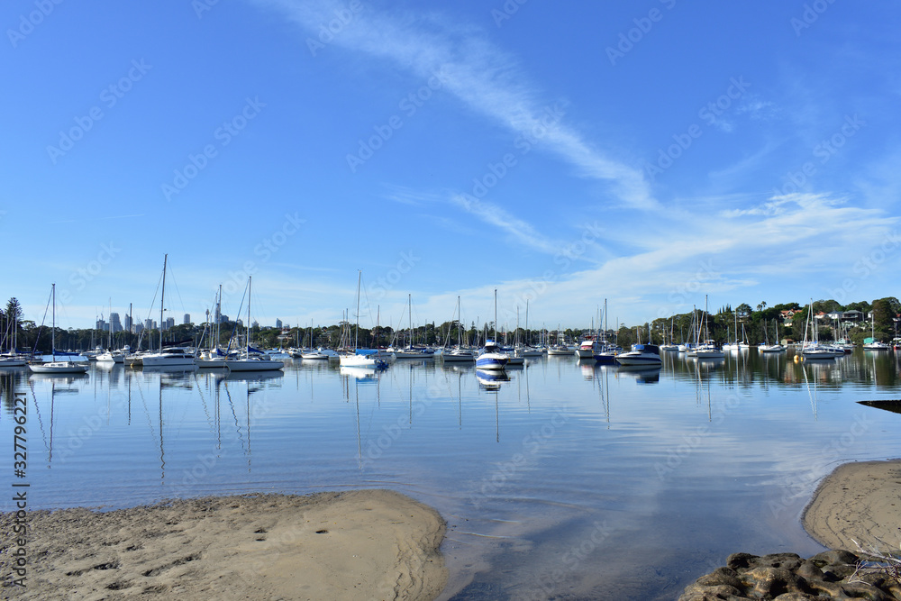 Obraz premium quiet waterside with moored boats