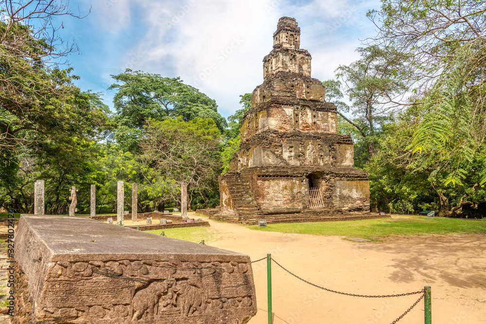 View at the Sathmahal prasada tower and Stone book in Jayanthipura complex in Polonnaruwa - Sri Lanka View at the Sathmahal prasada tower and Stone book in Jayanthipura complex in Polonnaruwa - Sri Lanka