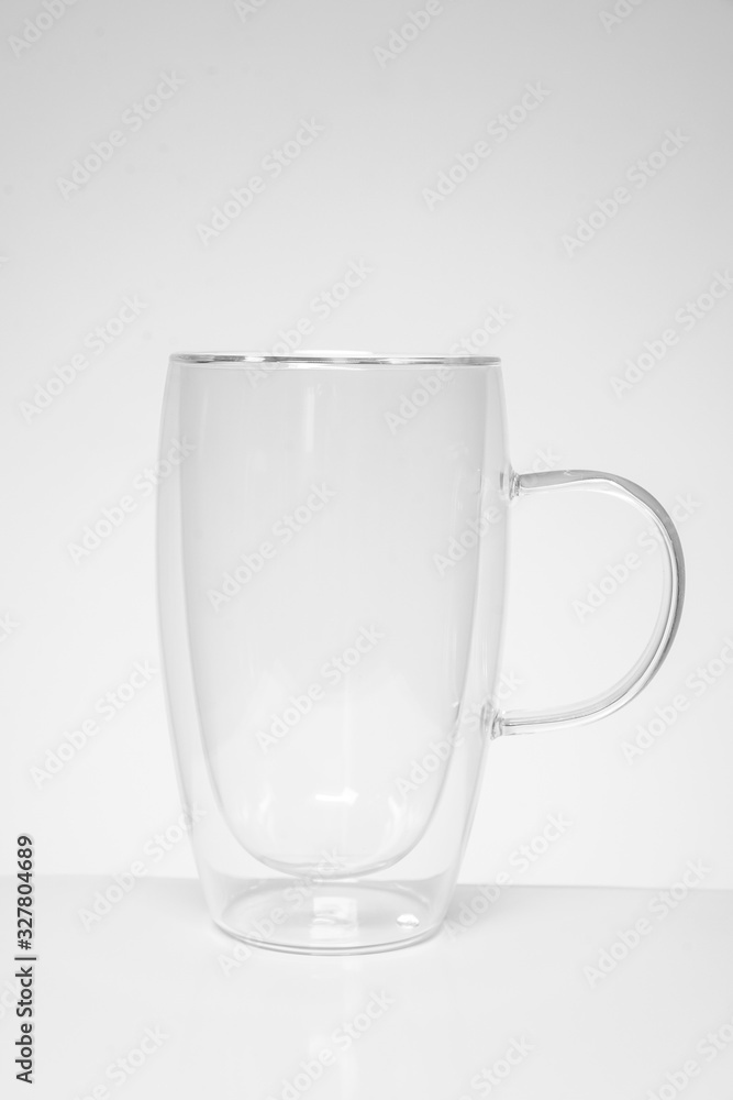 empty tea or coffee mug made of double transparent glass empty tea or coffee mug made of double transparent glass