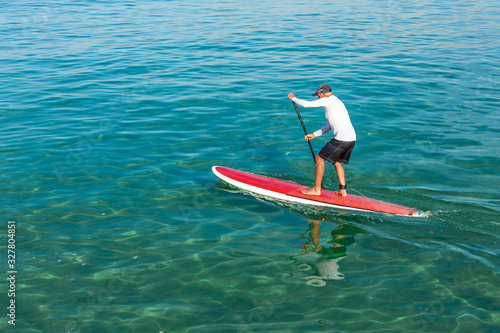 Photography Senior man practicing paddle