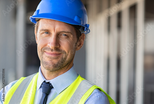 Successful engineer at building site photo