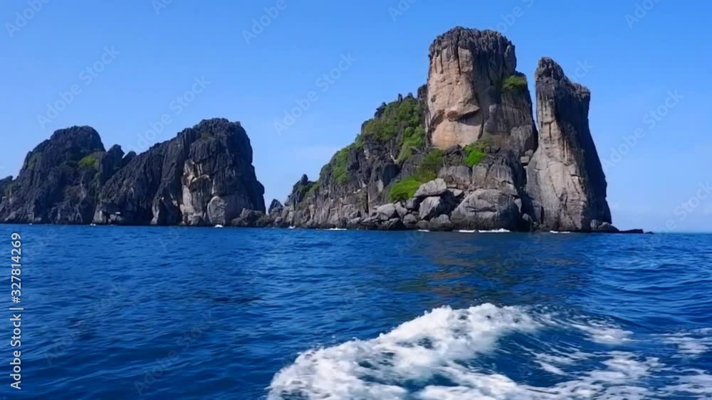 The rocky island shaped like a paying respect to hands is Ngam Yai island in Mu Ko Chumphon National Park, The best places a diving trip in Chumphon Thailand The rocky island shaped like a paying respect to hands is Ngam Yai island in Mu Ko Chumphon National Park, The best places a diving trip in Chumphon Thailand