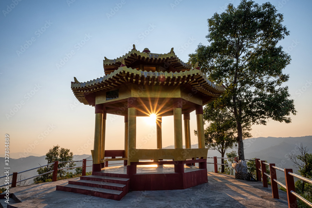 Sunset at the pavilion on Doi Mae Salong in Chiangrai,Thailand.