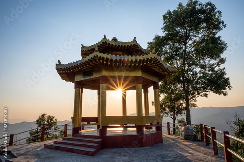 Sunset at the pavilion on Doi Mae Salong in Chiangrai Thailand.