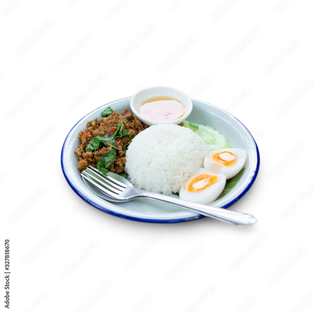 Fried Pork with basil leaf on rice with Medium-boiled egg isolate on white background.