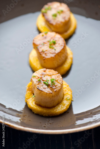 Scallops. Sea Scallops seared in brown butter sauce and garnished with a lemon sauce. 