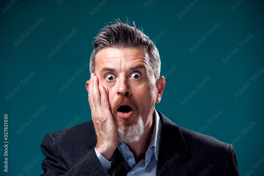 A portrait of bearded surprised man. People and emotions concept A portrait of bearded surprised man. People and emotions concept